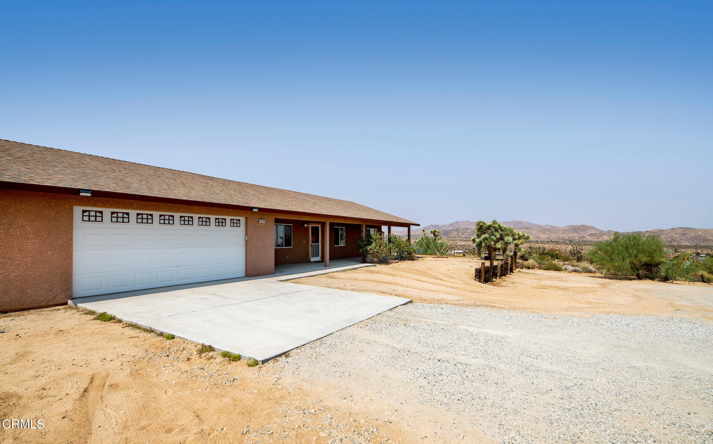 6864 Sunnyhill Road Joshua Tree, CA 92252 - Photo 6 of 71 a view of an house with a outdoor space