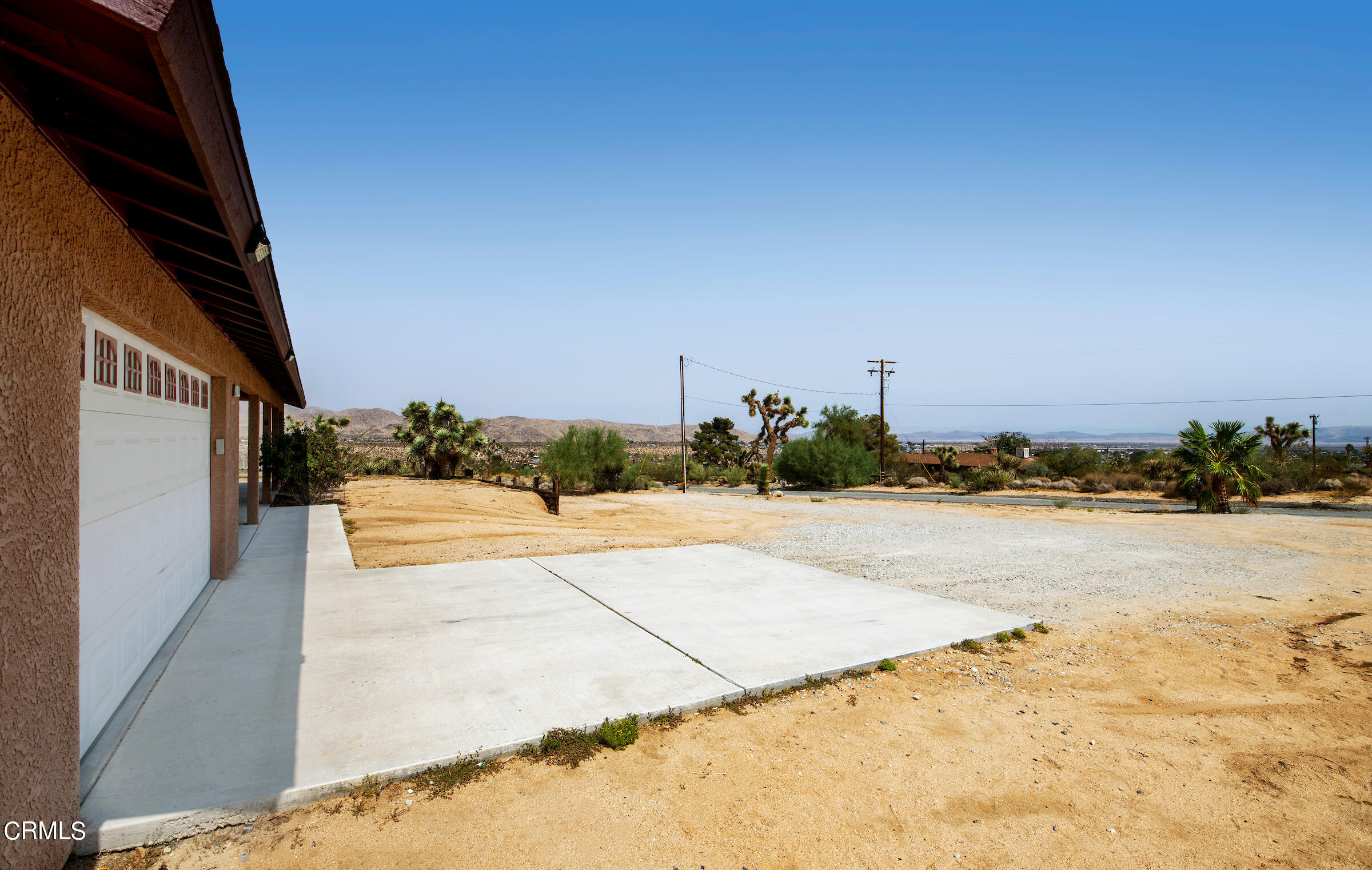 6864 Sunnyhill Road Joshua Tree, CA 92252 - Photo 7 of 71 a view of a terrace