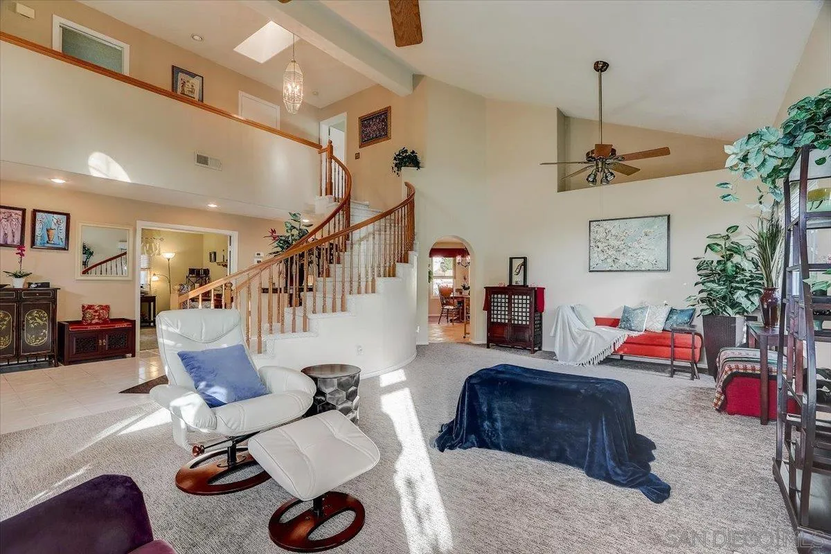 14381 Silver Heights Road Poway, CA 92064 - Photo 12 of 56 a living room with furniture and a table