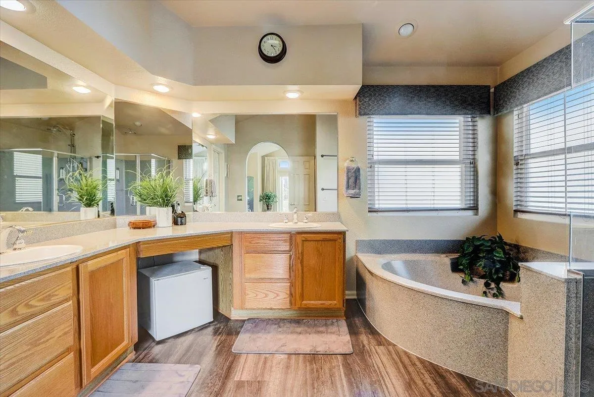 14381 Silver Heights Road Poway, CA 92064 - Photo 33 of 56 a large white kitchen with a large window