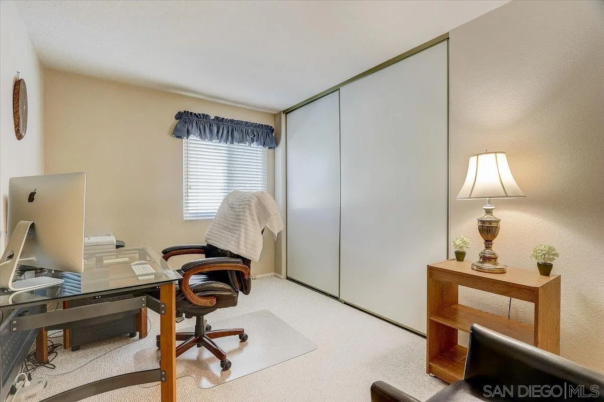 14381 Silver Heights Road Poway, CA 92064 - Photo 39 of 56 a workspace with furniture and lamp