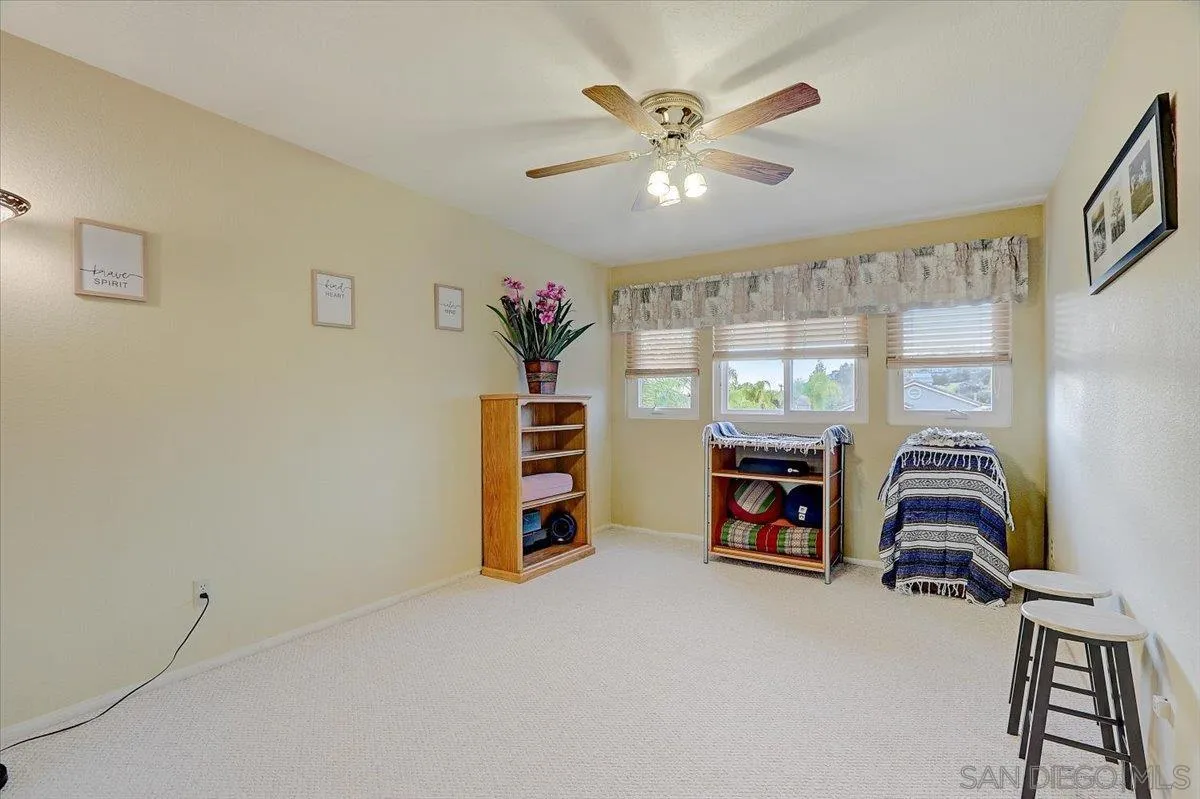 14381 Silver Heights Road Poway, CA 92064 - Photo 40 of 56 a view of a livingroom with furniture and a window