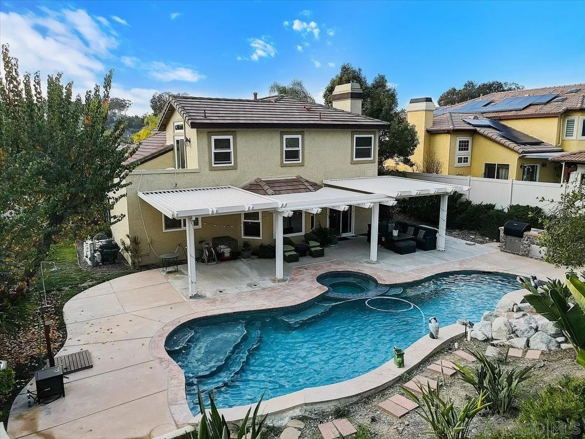 14381 Silver Heights Road Poway, CA 92064 - Photo 55 of 56 a view of a dinning table and chairs in patio