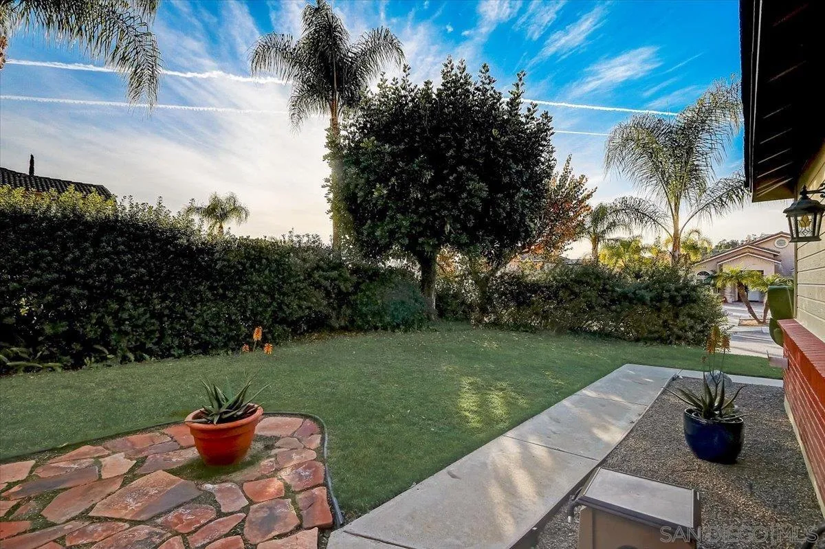 14381 Silver Heights Road Poway, CA 92064 - Photo 8 of 56 a view of a table and chairs in the garden