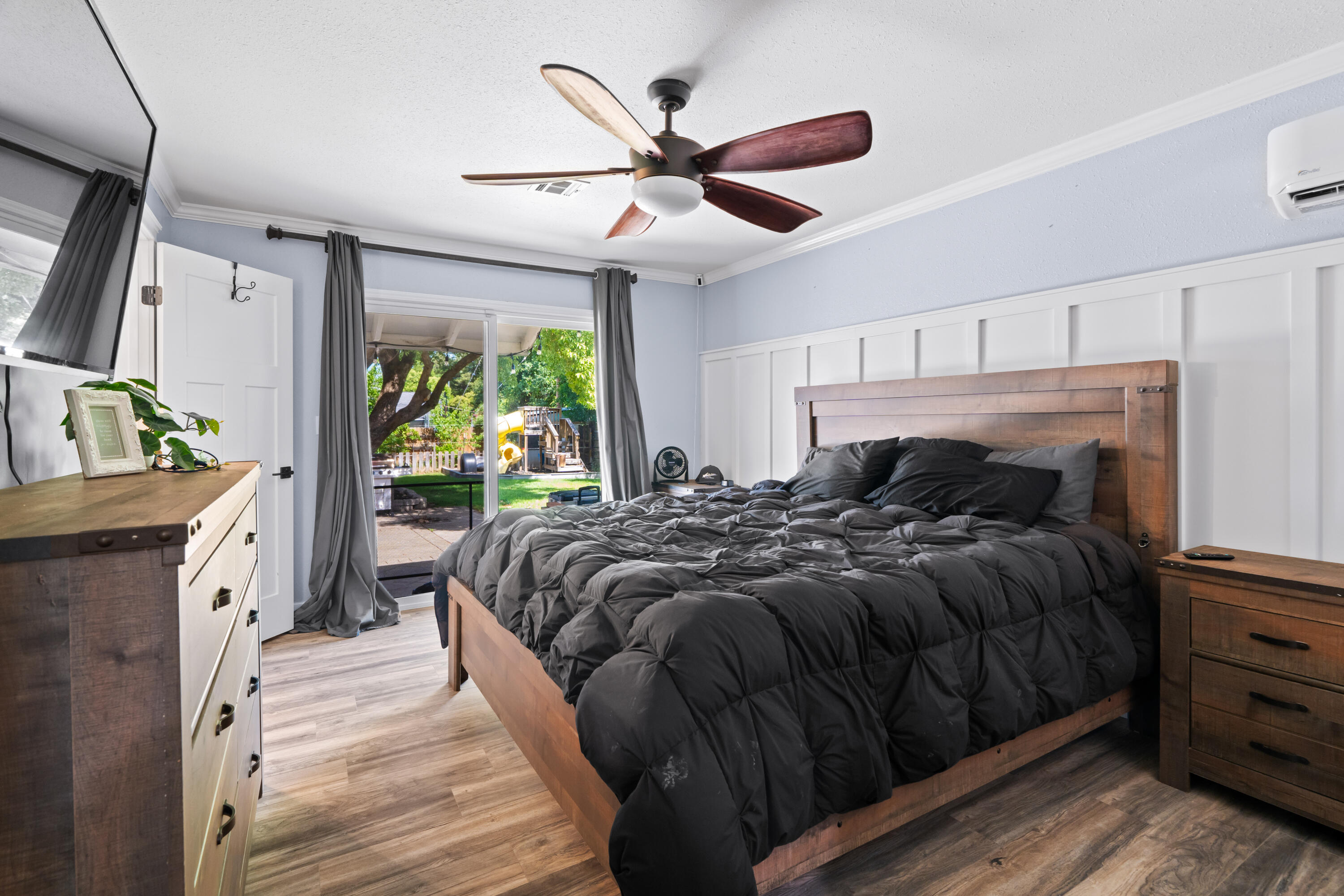 3689 Suzanne Way Redding, CA 96002 - Photo 22 of 46 a bed sitting in a bedroom next to a window