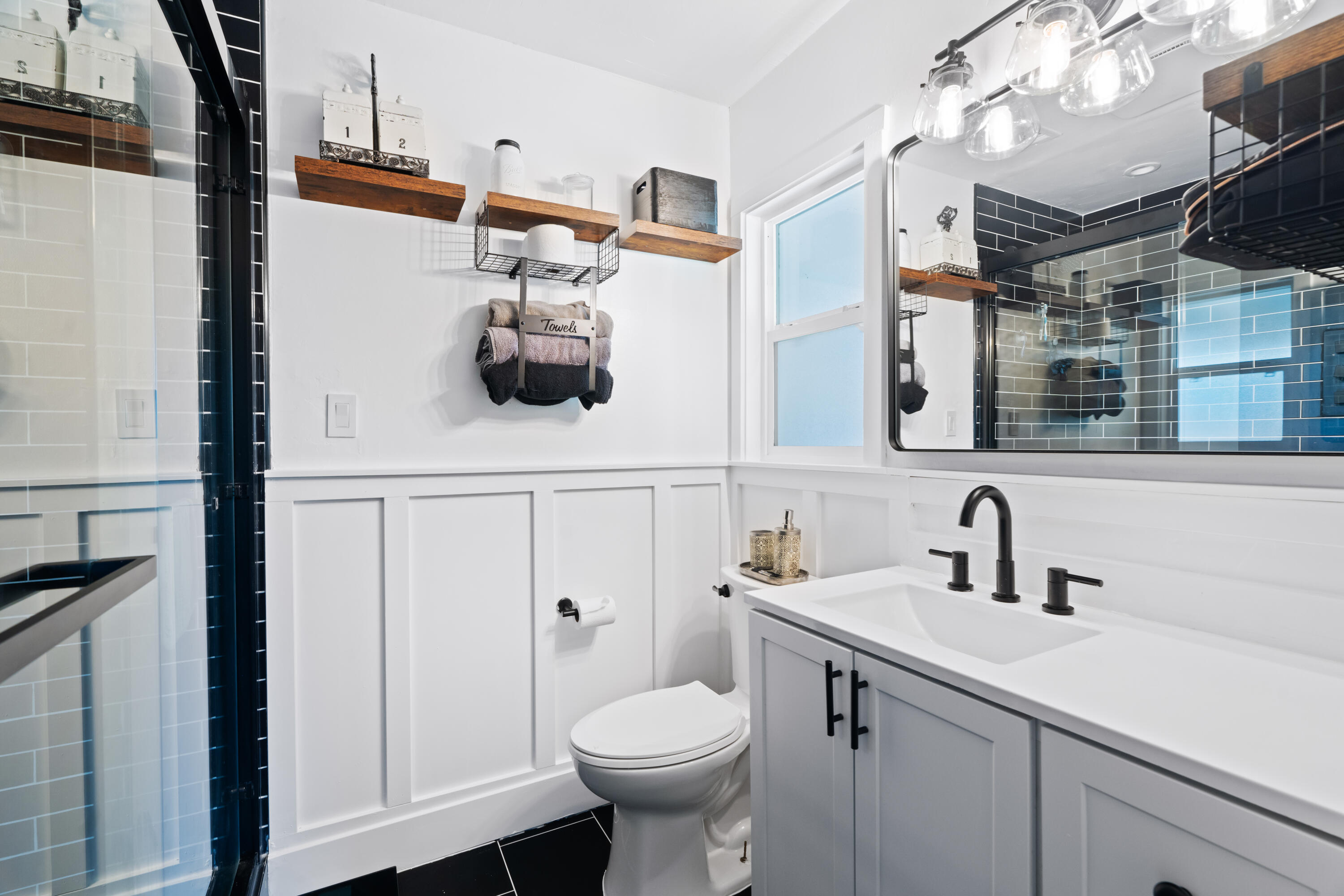3689 Suzanne Way Redding, CA 96002 - Photo 24 of 46 a bathroom with a sink toilet and shower