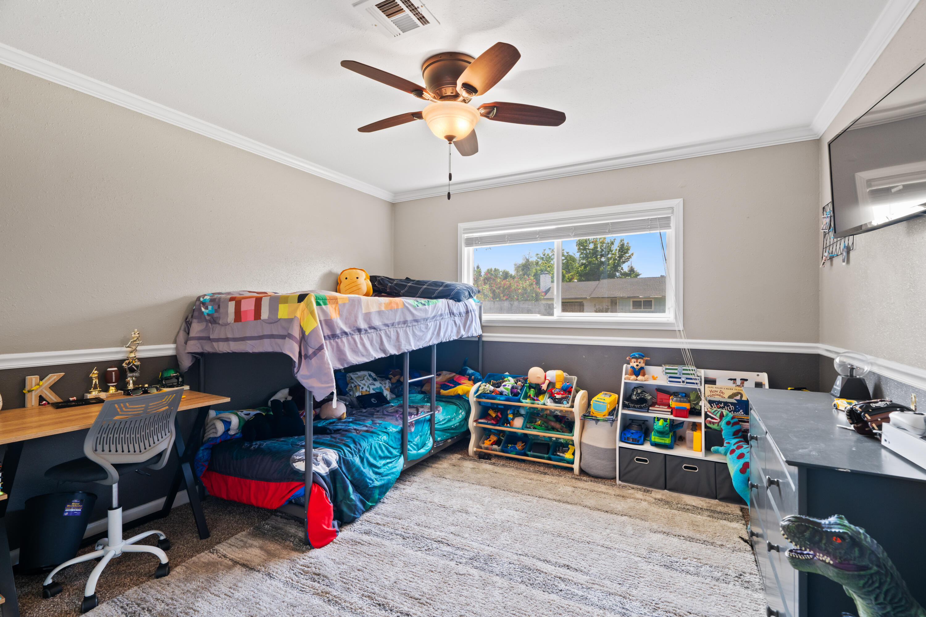 3689 Suzanne Way Redding, CA 96002 - Photo 28 of 46 a bed room with furniture and a window