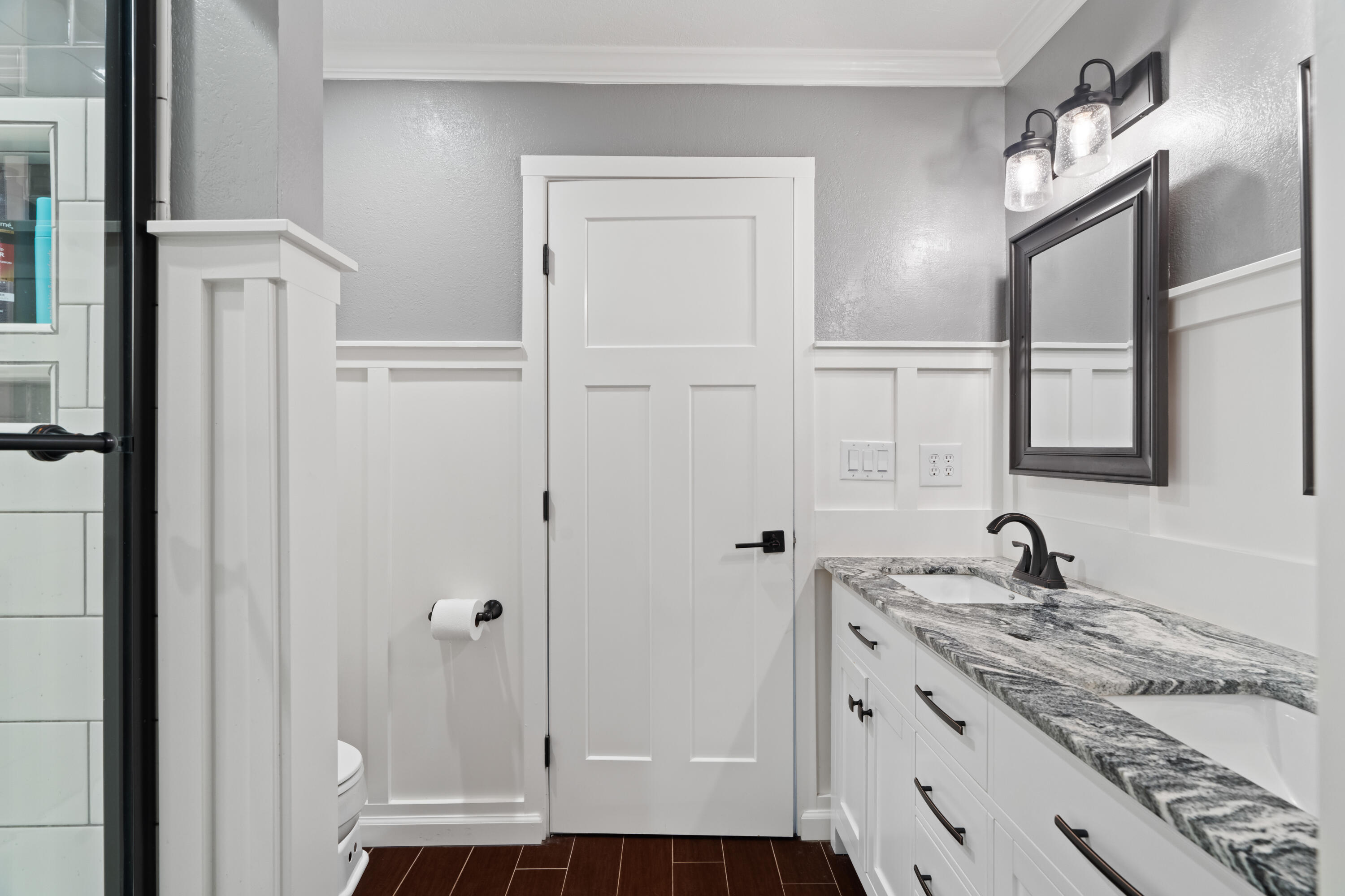 3689 Suzanne Way Redding, CA 96002 - Photo 30 of 46 a bathroom with a granite countertop sink and a mirror