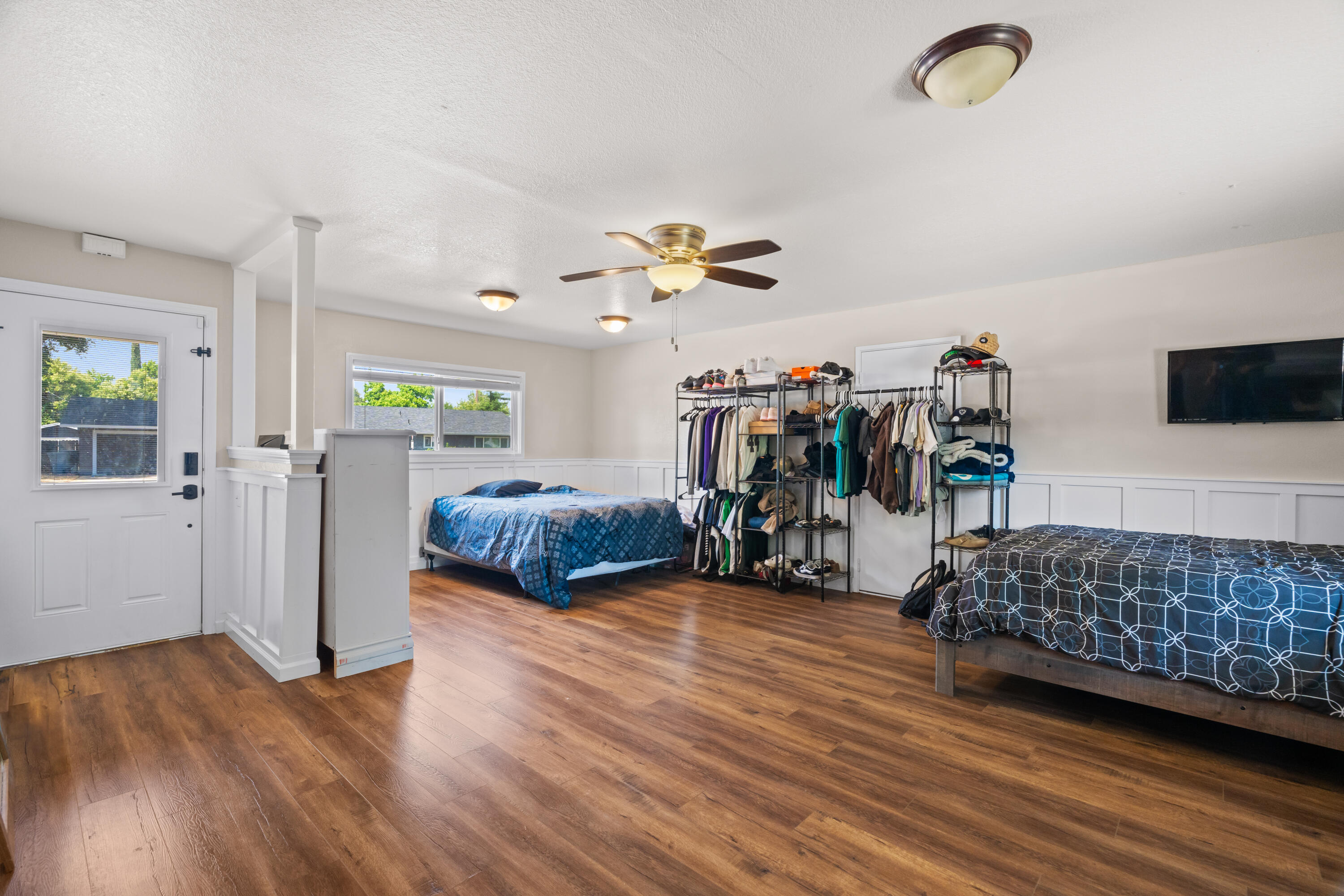 3689 Suzanne Way Redding, CA 96002 - Photo 35 of 46 a living room with furniture and a flat screen tv