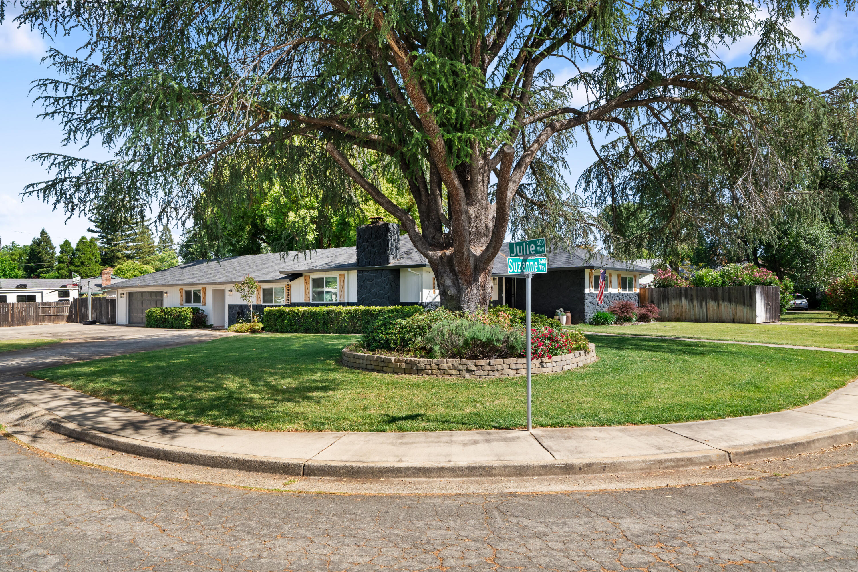 3689 Suzanne Way Redding, CA 96002 - Photo 46 of 46 a front view of a house with a yard