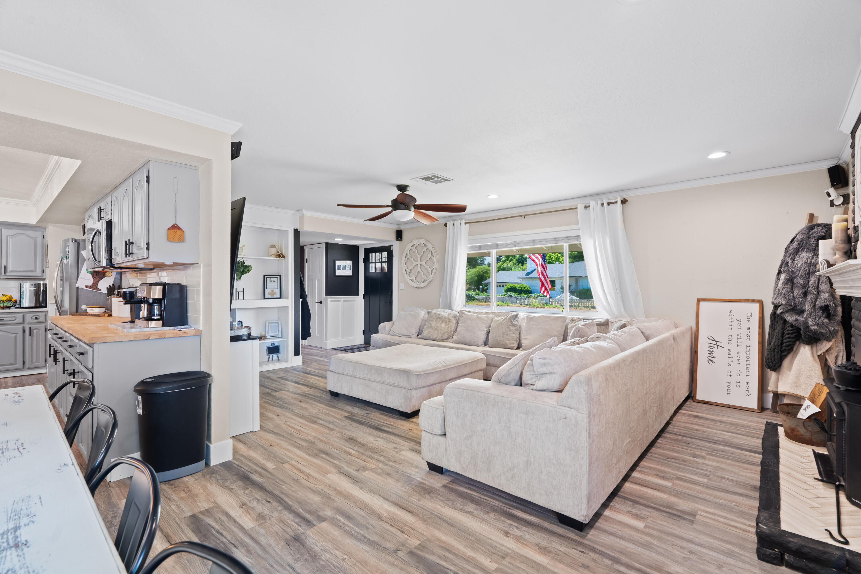 3689 Suzanne Way Redding, CA 96002 - Photo 7 of 46 a living room with furniture and a flat screen tv