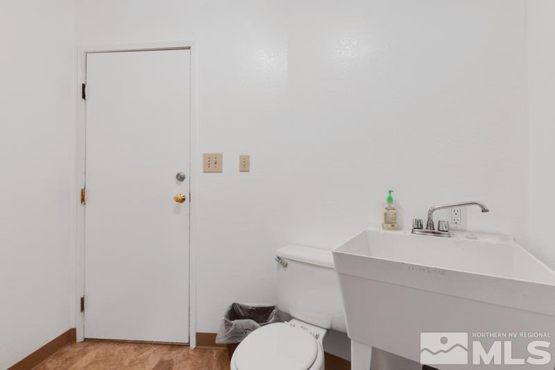 60 Rodeo Drive Reno, NV 89508 - Photo 17 of 37 a bathroom with a sink and a toilet