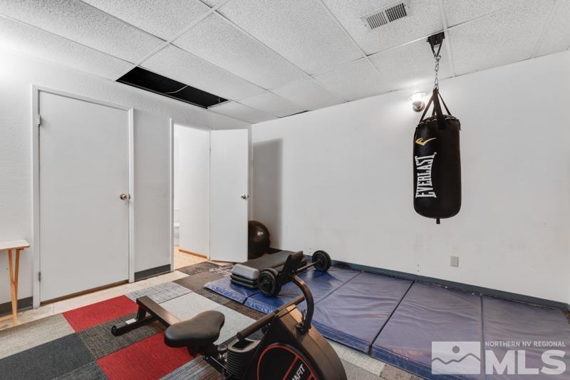 60 Rodeo Drive Reno, NV 89508 - Photo 19 of 37 a bed room with a bed and a window