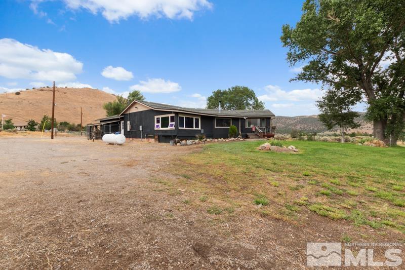 60 Rodeo Drive Reno, NV 89508 - Photo 23 of 37 a view of a house with yard and sitting area