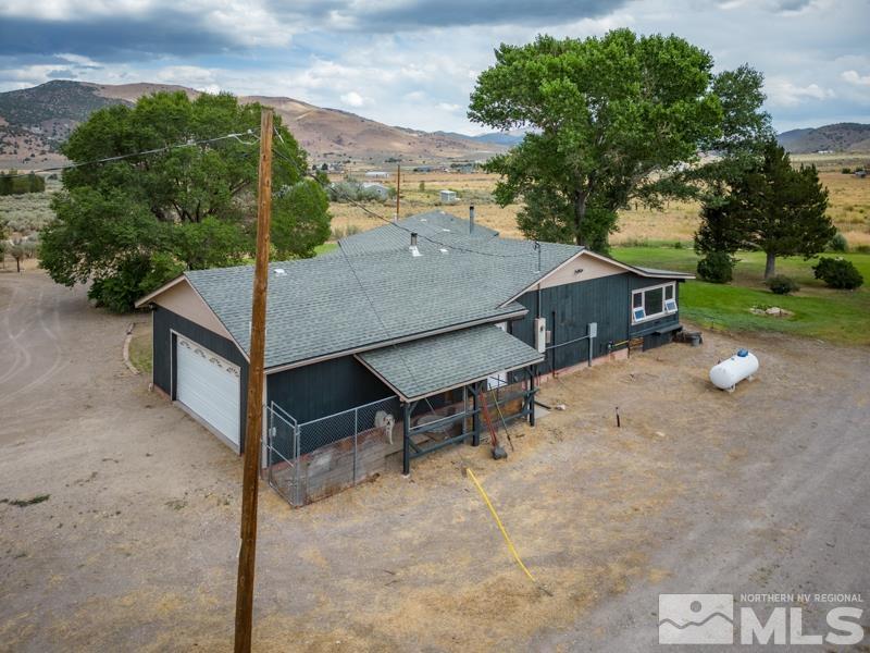 60 Rodeo Drive Reno, NV 89508 - Photo 24 of 37 a view of a terrace with a table and chairs
