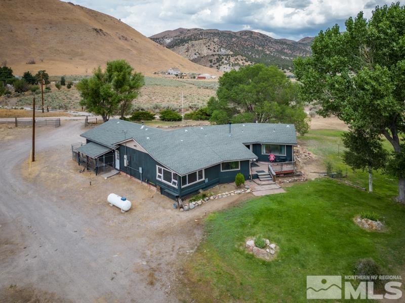 60 Rodeo Drive Reno, NV 89508 - Photo 25 of 37 an aerial view of a house with backyard space and balcony