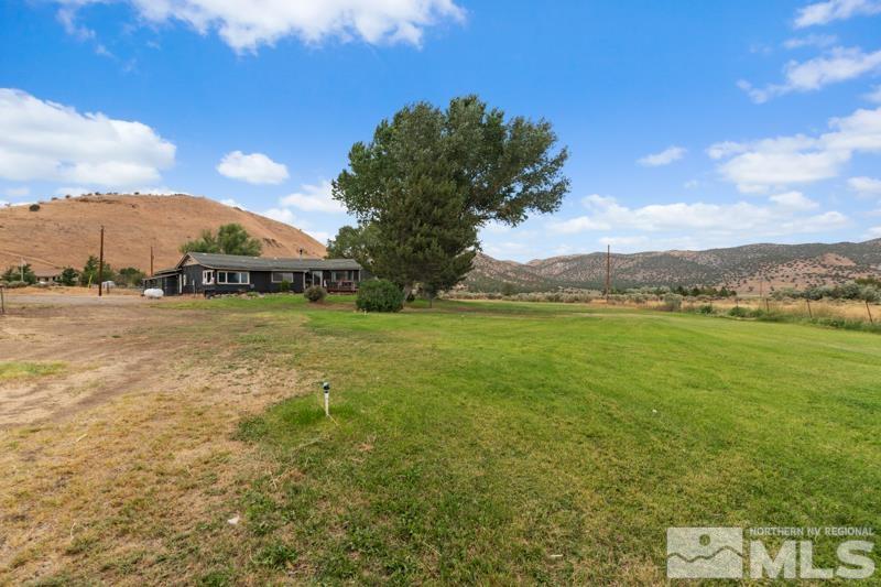 60 Rodeo Drive Reno, NV 89508 - Photo 27 of 37 a view of a lake with houses in the back