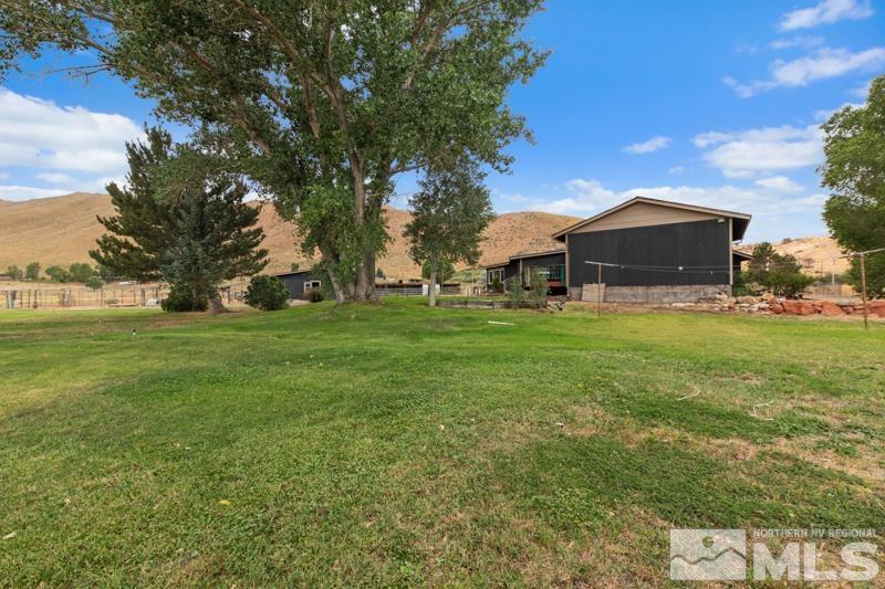 60 Rodeo Drive Reno, NV 89508 - Photo 28 of 37 a view of a house with a yard