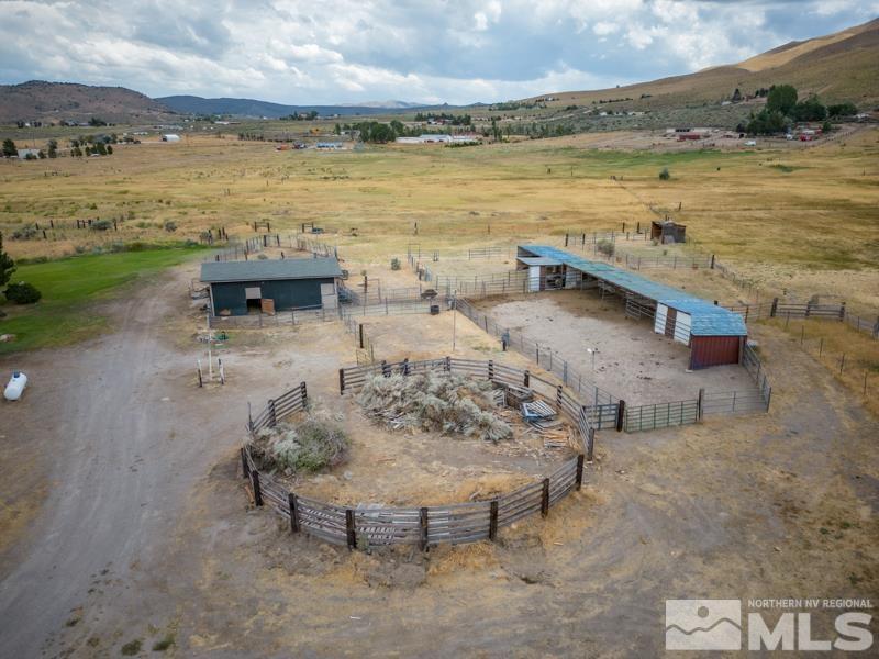 60 Rodeo Drive Reno, NV 89508 - Photo 33 of 37 a view of a lake with a table and chairs