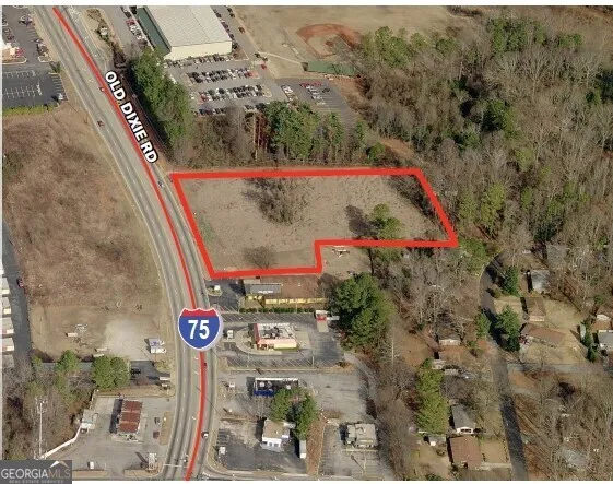 an aerial view of a red and white house