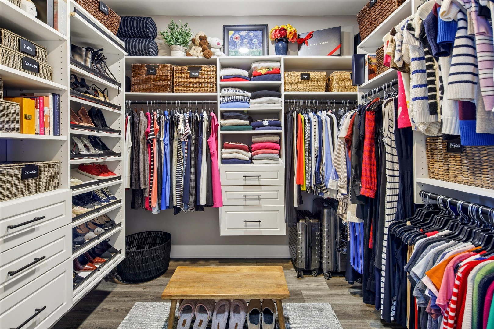 175 East Delaware Place, Unit 7304 Chicago, IL 60611 - Photo 19 of 36 a view of walk in closet with clothes and shoes