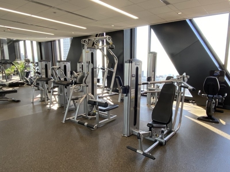 175 East Delaware Place, Unit 7304 Chicago, IL 60611 - Photo 31 of 36 a view of a room with gym equipment