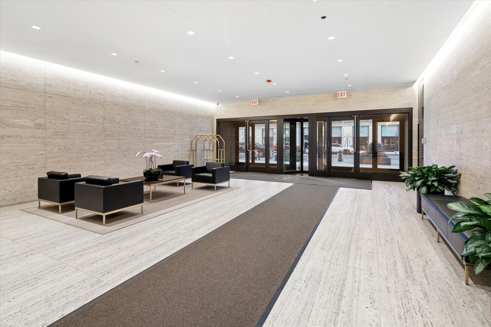 175 East Delaware Place, Unit 7304 Chicago, IL 60611 - Photo 34 of 36 a lobby with furniture and a potted plant