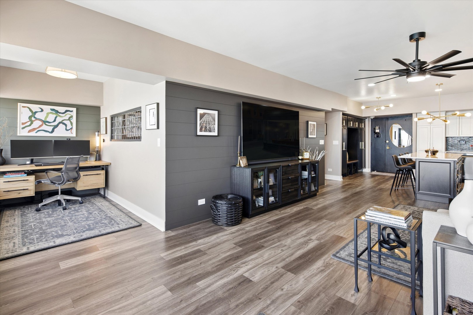 175 East Delaware Place, Unit 7304 Chicago, IL 60611 - Photo 6 of 36 a living room with furniture and a flat screen tv