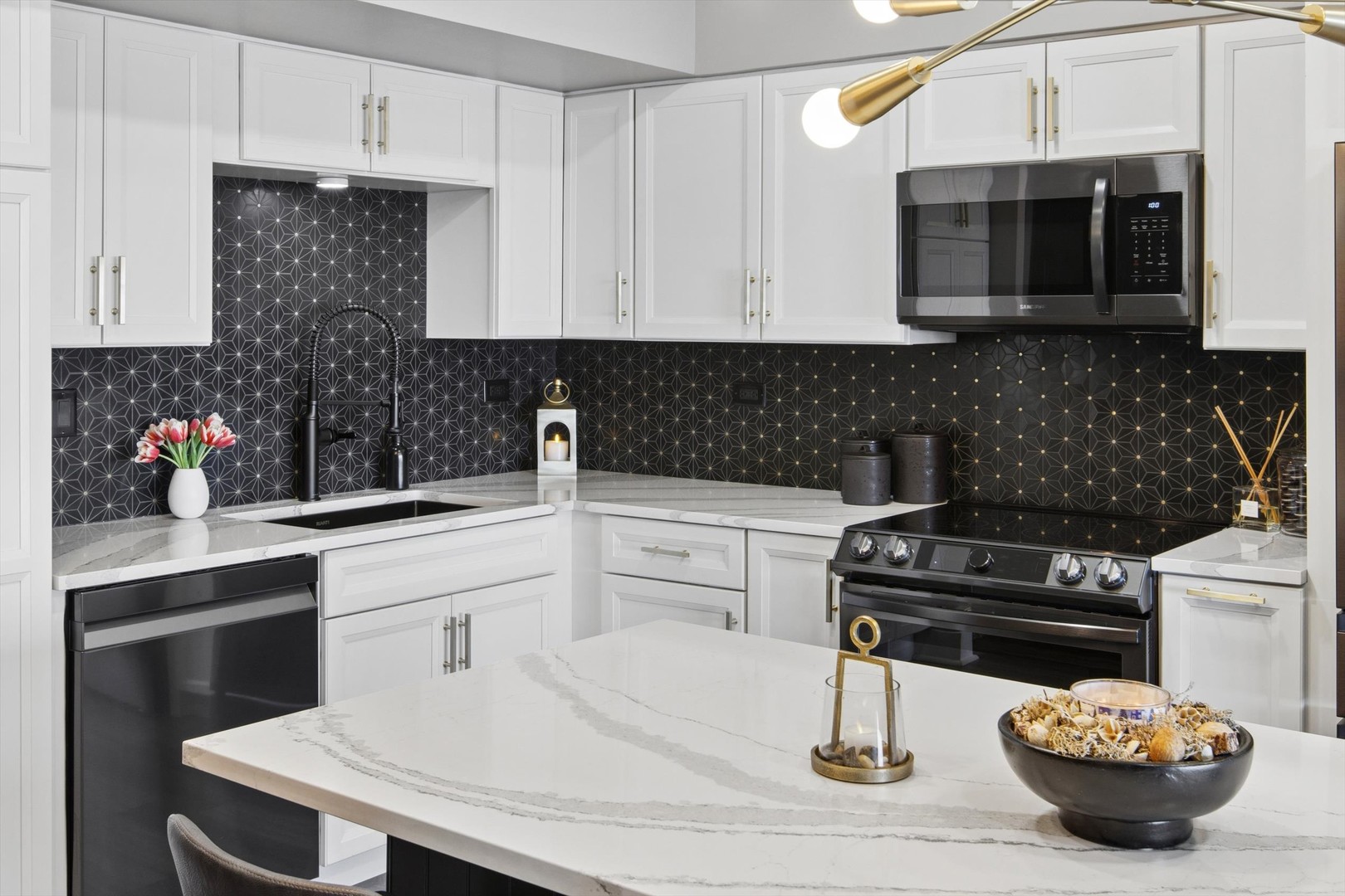 175 East Delaware Place, Unit 7304 Chicago, IL 60611 - Photo 10 of 36 a kitchen with a sink and cabinets