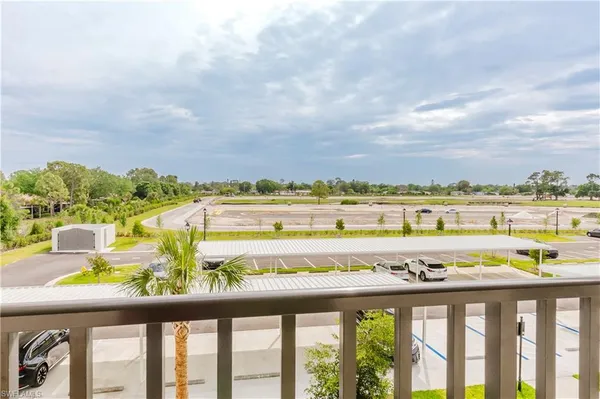a city view from a balcony with outdoor space