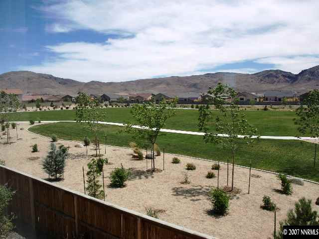 10532 Iron Point Circle Reno, NV 89521 - Photo 6 of 6 a view of a lake with a mountain in the background