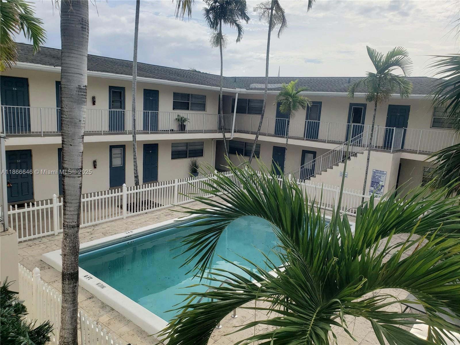 a view of a yard in front of a building