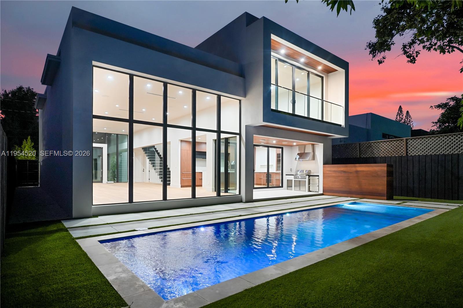 229 Northwest 42nd Street Miami, FL 33127 - Photo 1 of 37 a view of swimming pool with outdoor seating