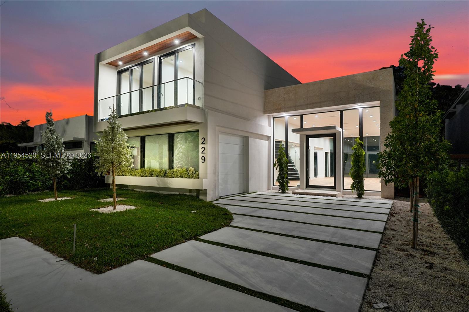 229 Northwest 42nd Street Miami, FL 33127 - Photo 2 of 37 a view of a house with a yard