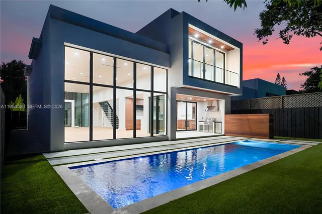 a view of swimming pool with outdoor seating