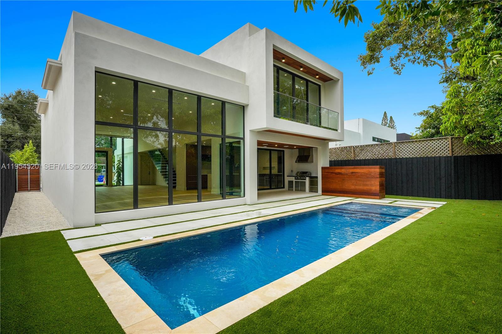 229 Northwest 42nd Street Miami, FL 33127 - Photo 3 of 37 a view of a house with a backyard