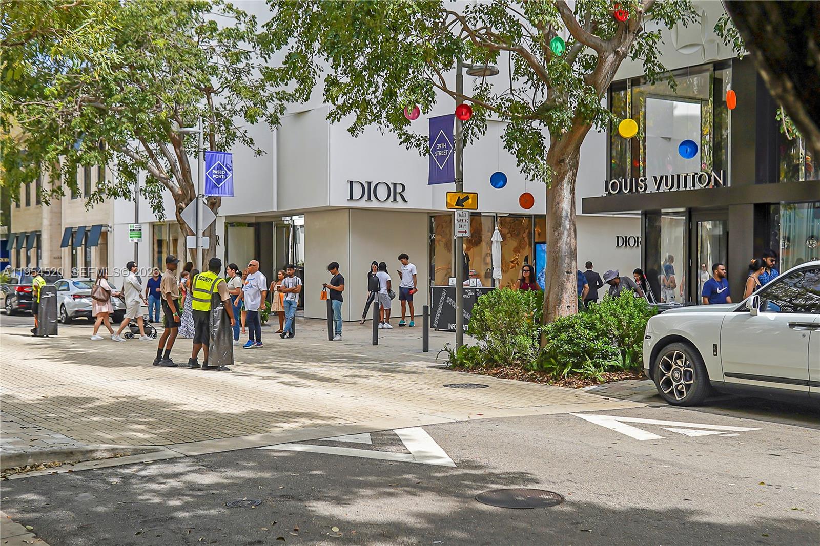 229 Northwest 42nd Street Miami, FL 33127 - Photo 34 of 37 a view of street and shops