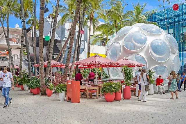 an outdoor space with lots of fruit and vegetables