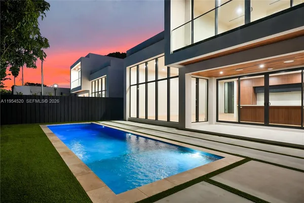 swimming pool with outdoor seating
