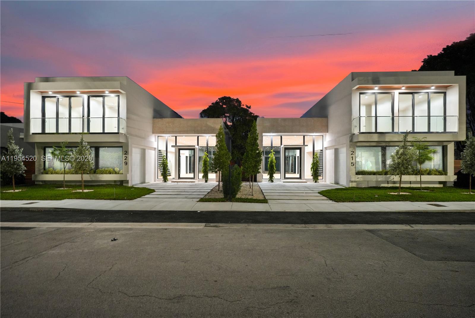 229 Northwest 42nd Street Miami, FL 33127 - Photo 5 of 37 front view of a house with a yard
