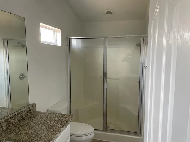 an empty room with a hallway