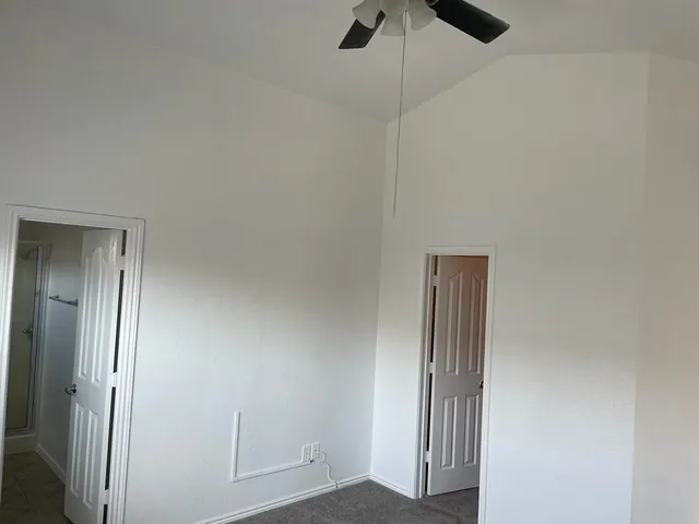 a view of a room that has a window in it