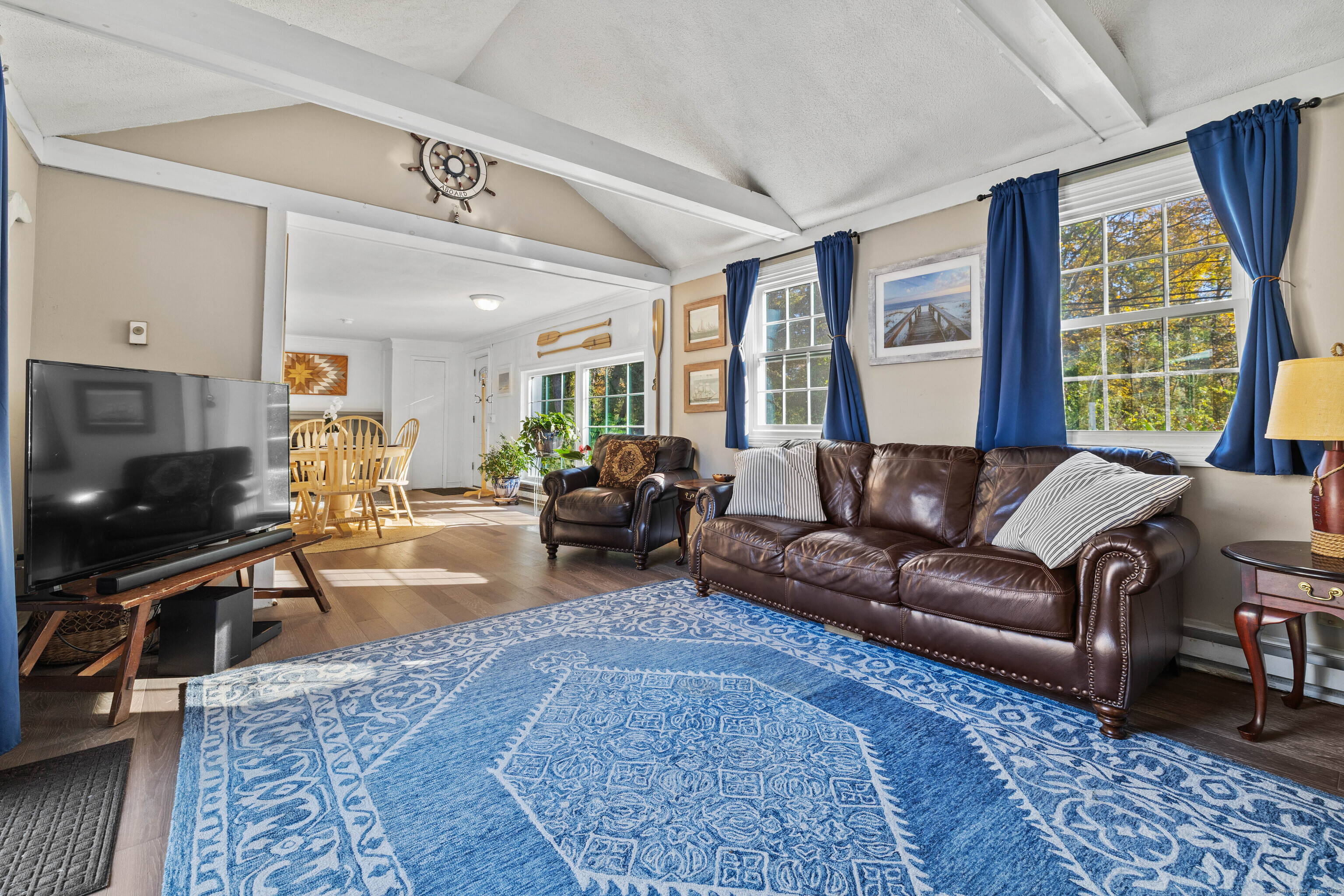 779 Summer Hill Road Madison, CT 06443 - Photo 19 of 40 a living room with furniture and a flat screen tv