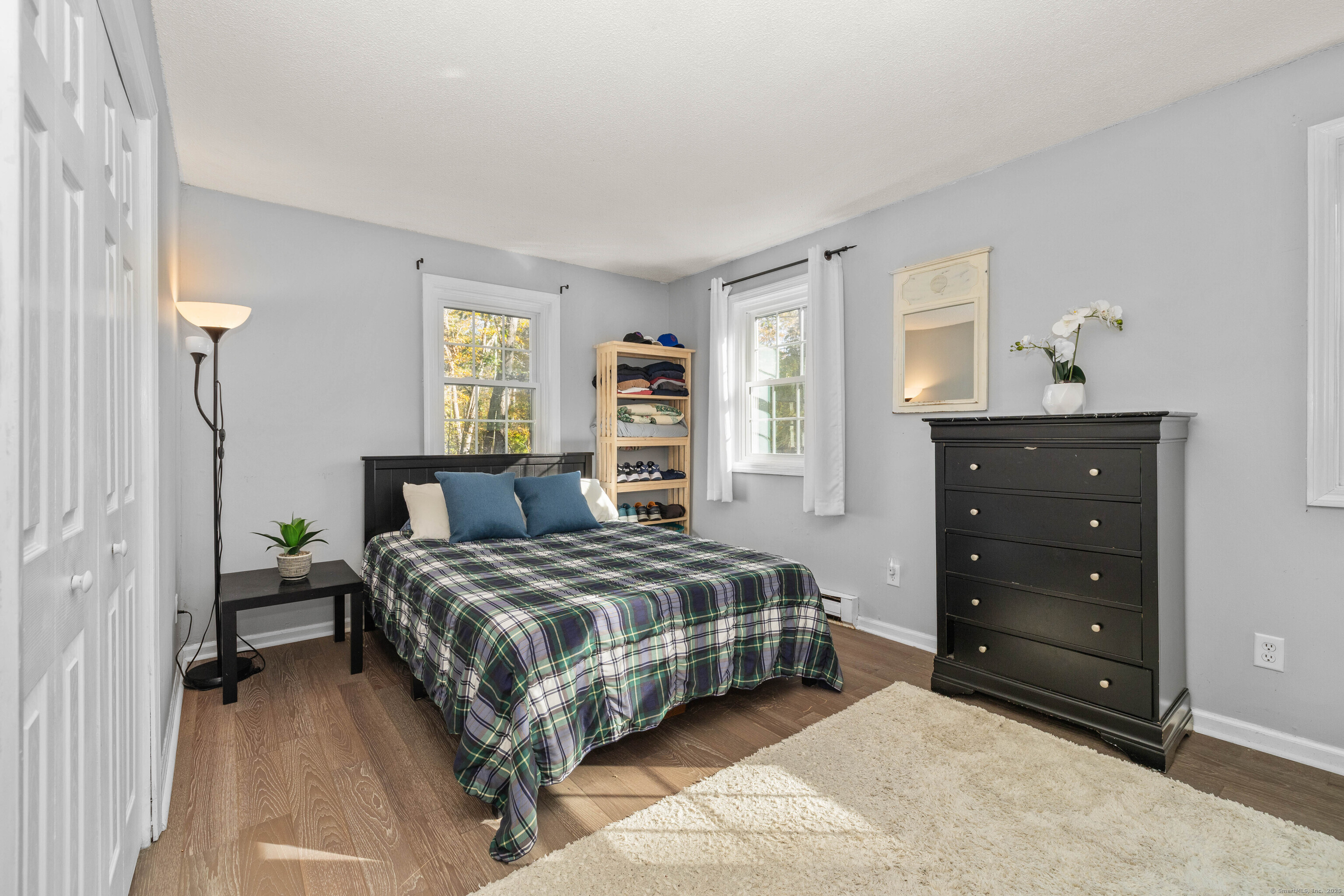 779 Summer Hill Road Madison, CT 06443 - Photo 28 of 40 a bedroom with a bed and a closet