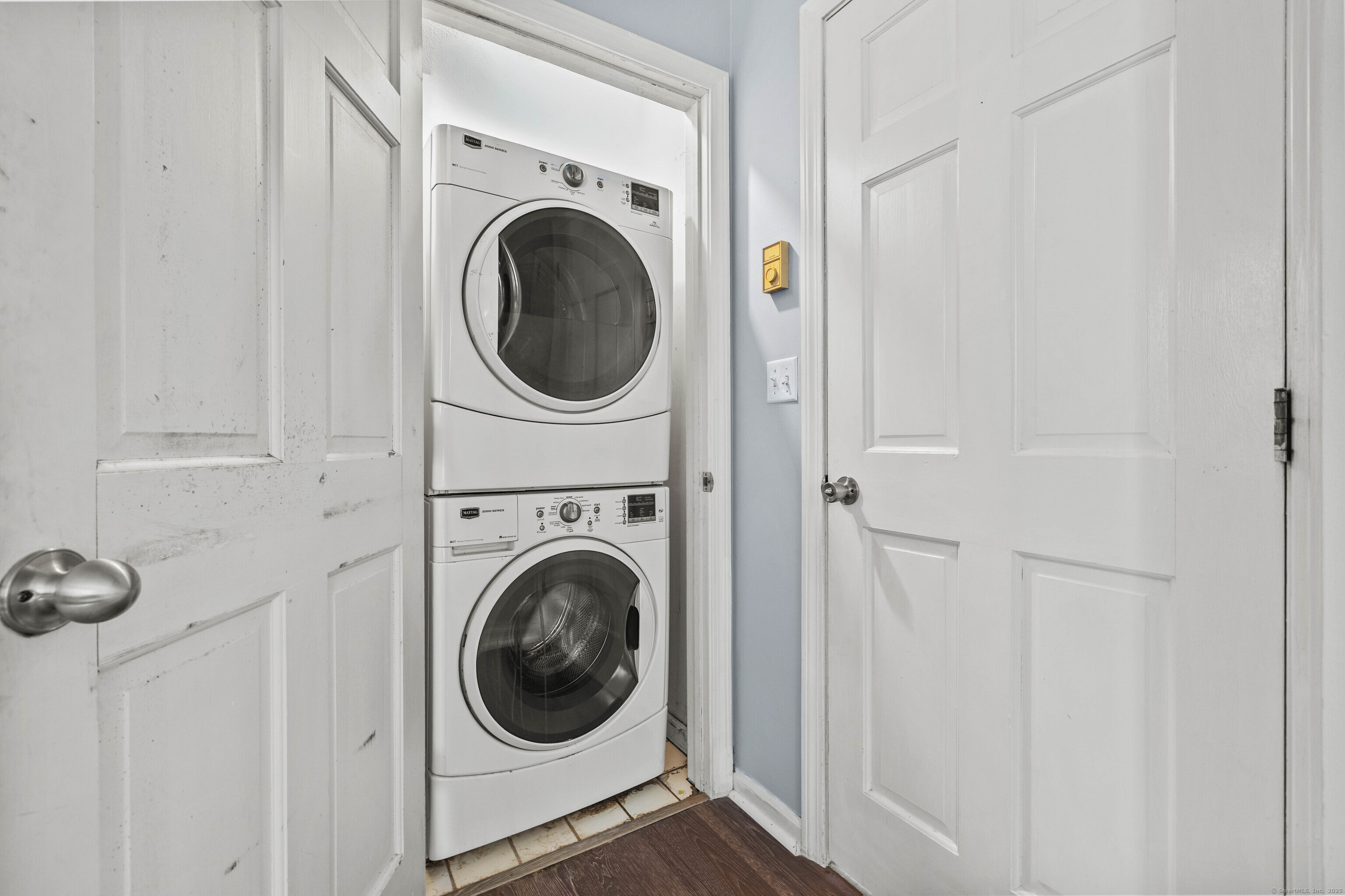 779 Summer Hill Road Madison, CT 06443 - Photo 30 of 40 a view of a hallway with washer and dryer