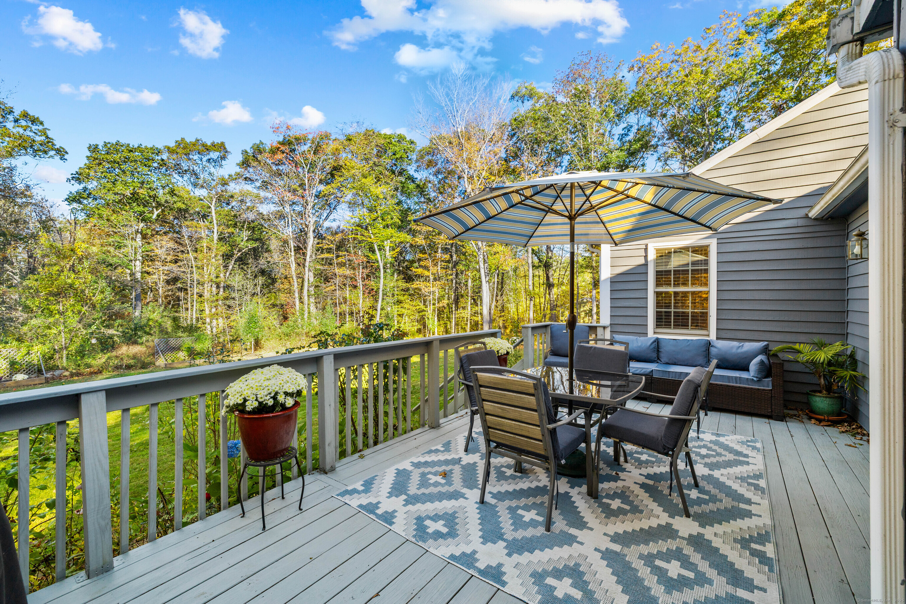 779 Summer Hill Road Madison, CT 06443 - Photo 31 of 40 a view of a chairs and table in the balcony