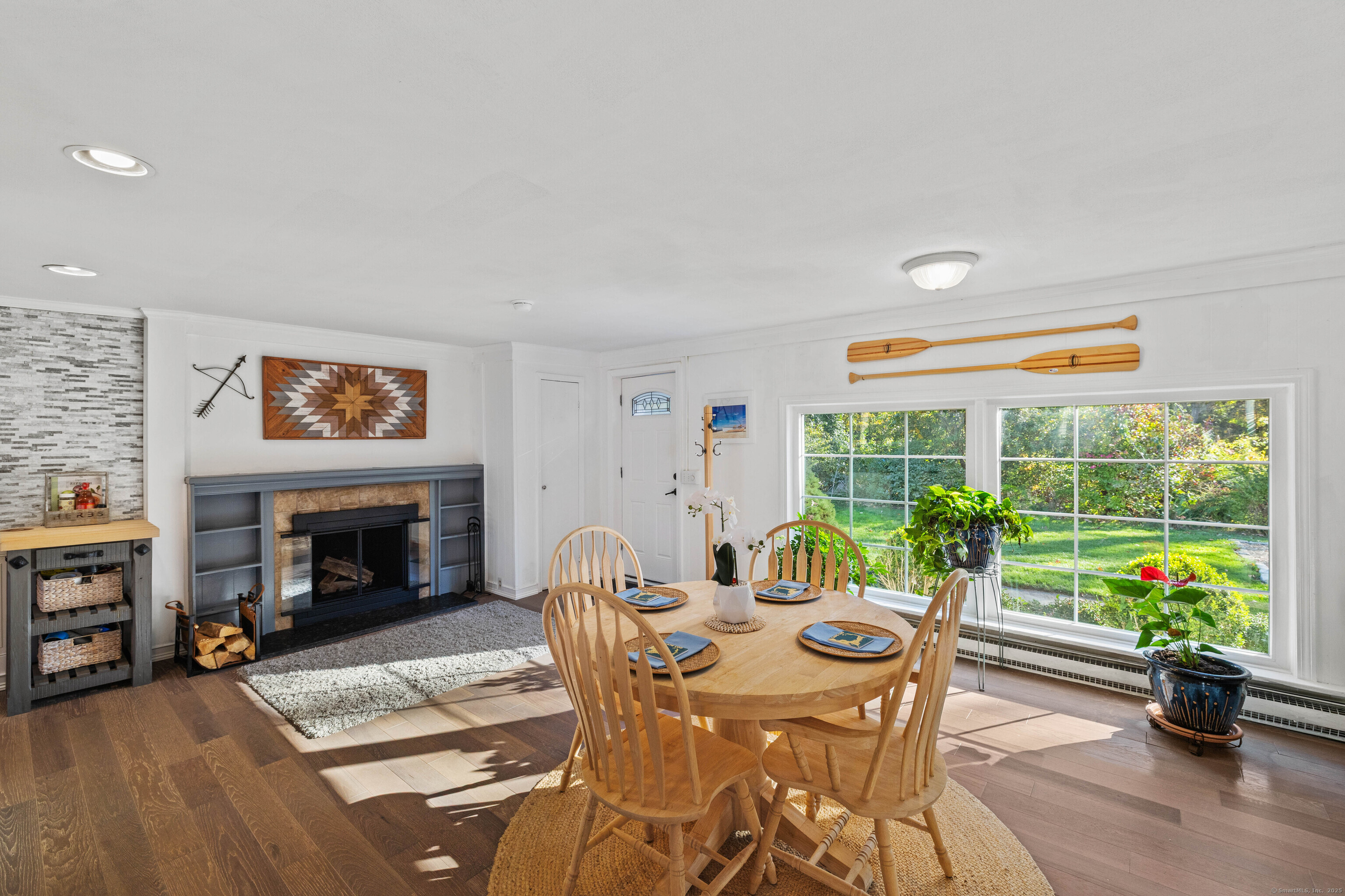 779 Summer Hill Road Madison, CT 06443 - Photo 8 of 40 a view of a dining room with furniture window and outside view