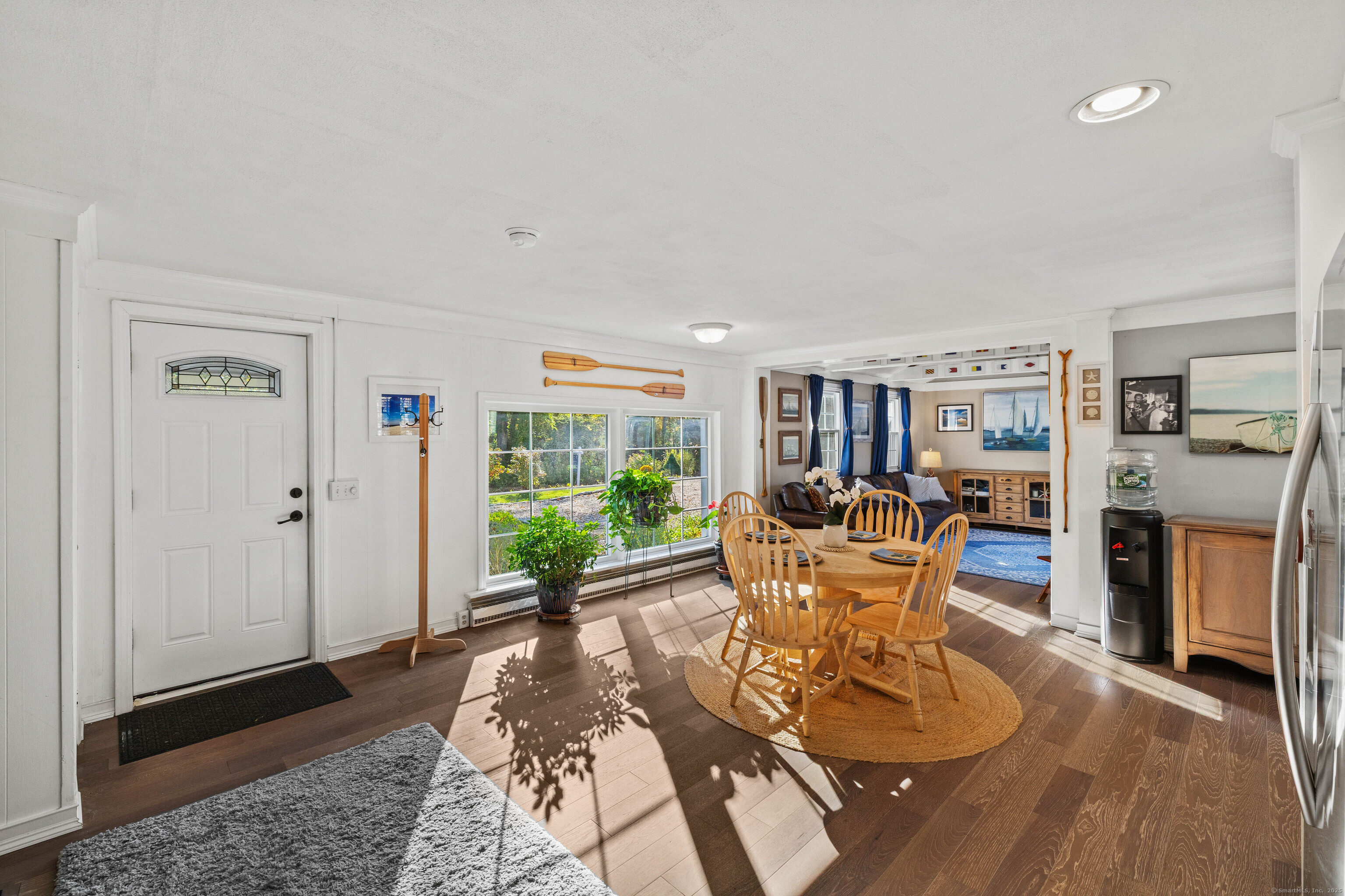 779 Summer Hill Road Madison, CT 06443 - Photo 9 of 40 a living room with furniture and a wooden floor