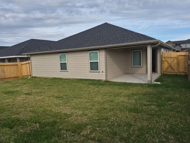 a front view of house with yard