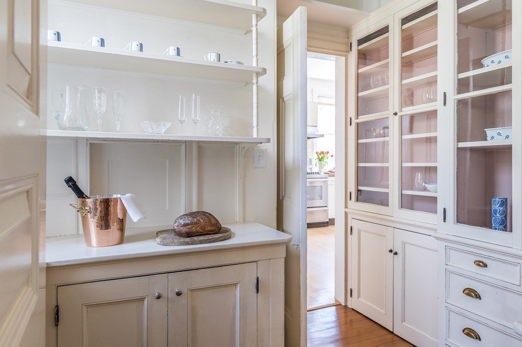 69 Garfield Street Watertown, MA 02472 - Photo 13 of 36 a kitchen with cabinets and window
